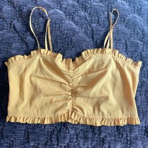 UO mustard yellow ruffle crop top